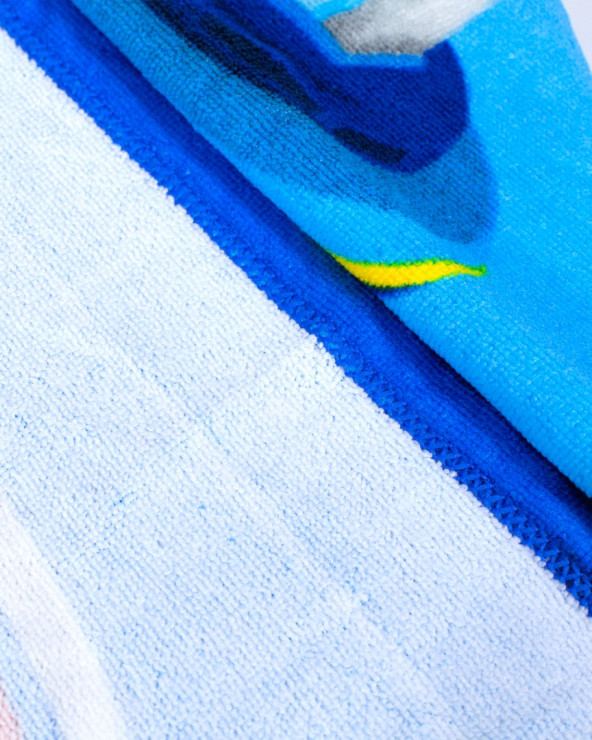 Toalla de playa infantill licencia · 100% microfibra · Sun&Surf